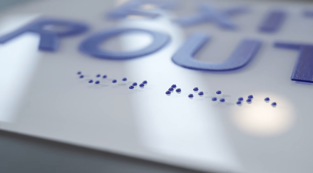 Example of a sign with Braille printed on it from the Epson SureColor V4000 UV Flatbed Printer.