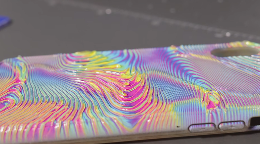 A phone case showcasing the ink stacking effect from the Epson V4000 UV Flatbed to create a layered design,